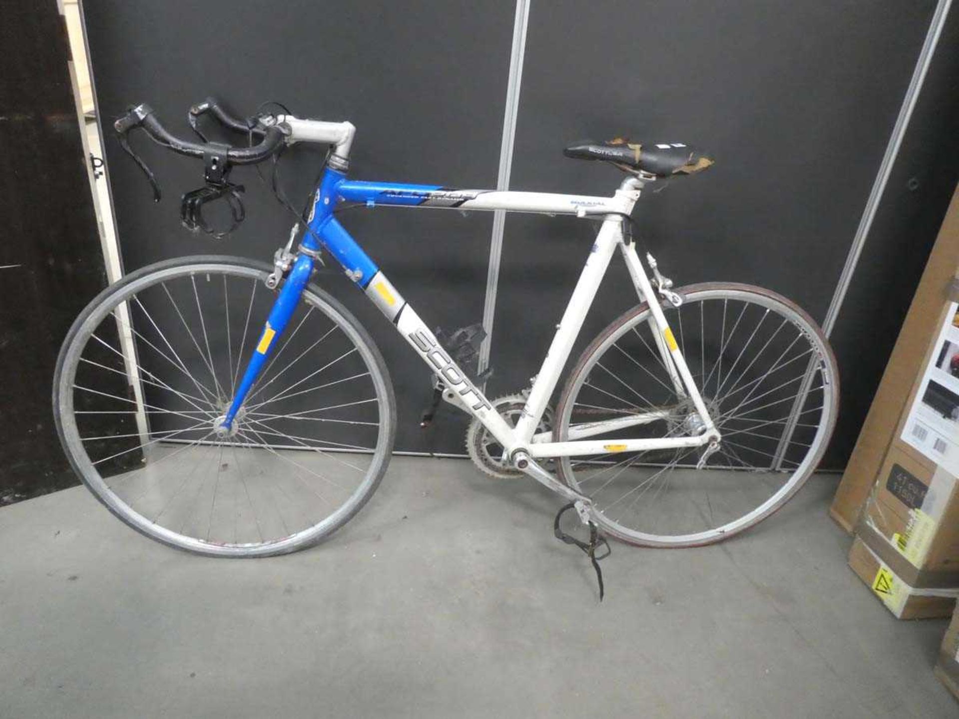 Scott racing cycle in blue and white