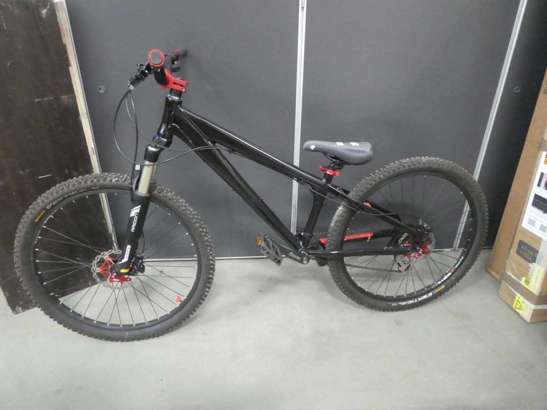 Black BMX style cycle with Raidon forks and Husseflet handle bars
