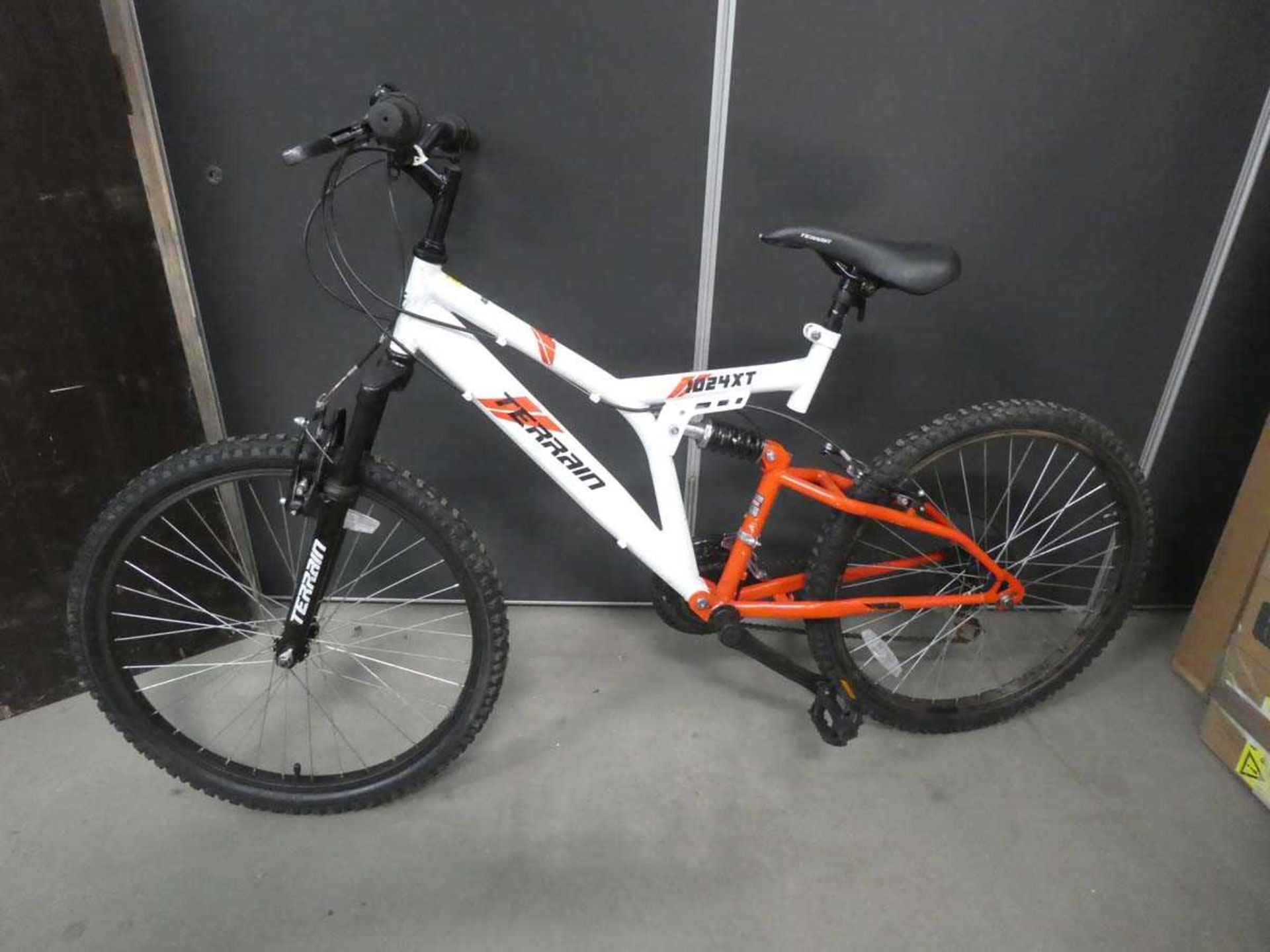 Small terrain red and white child's mountain bike