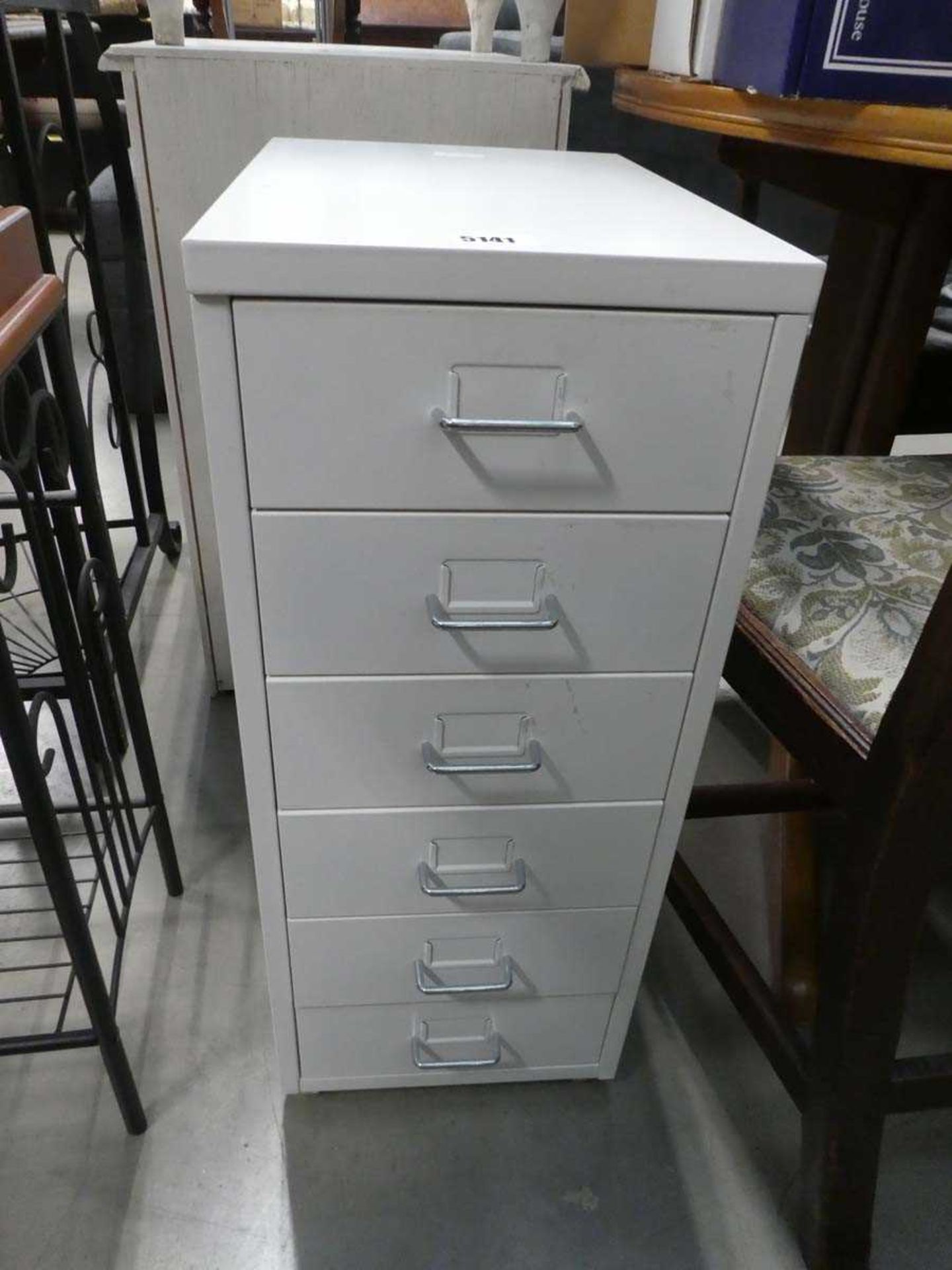 White painted metal filing cabinet