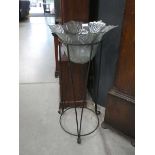 Moulded glass plant pot with metal stand