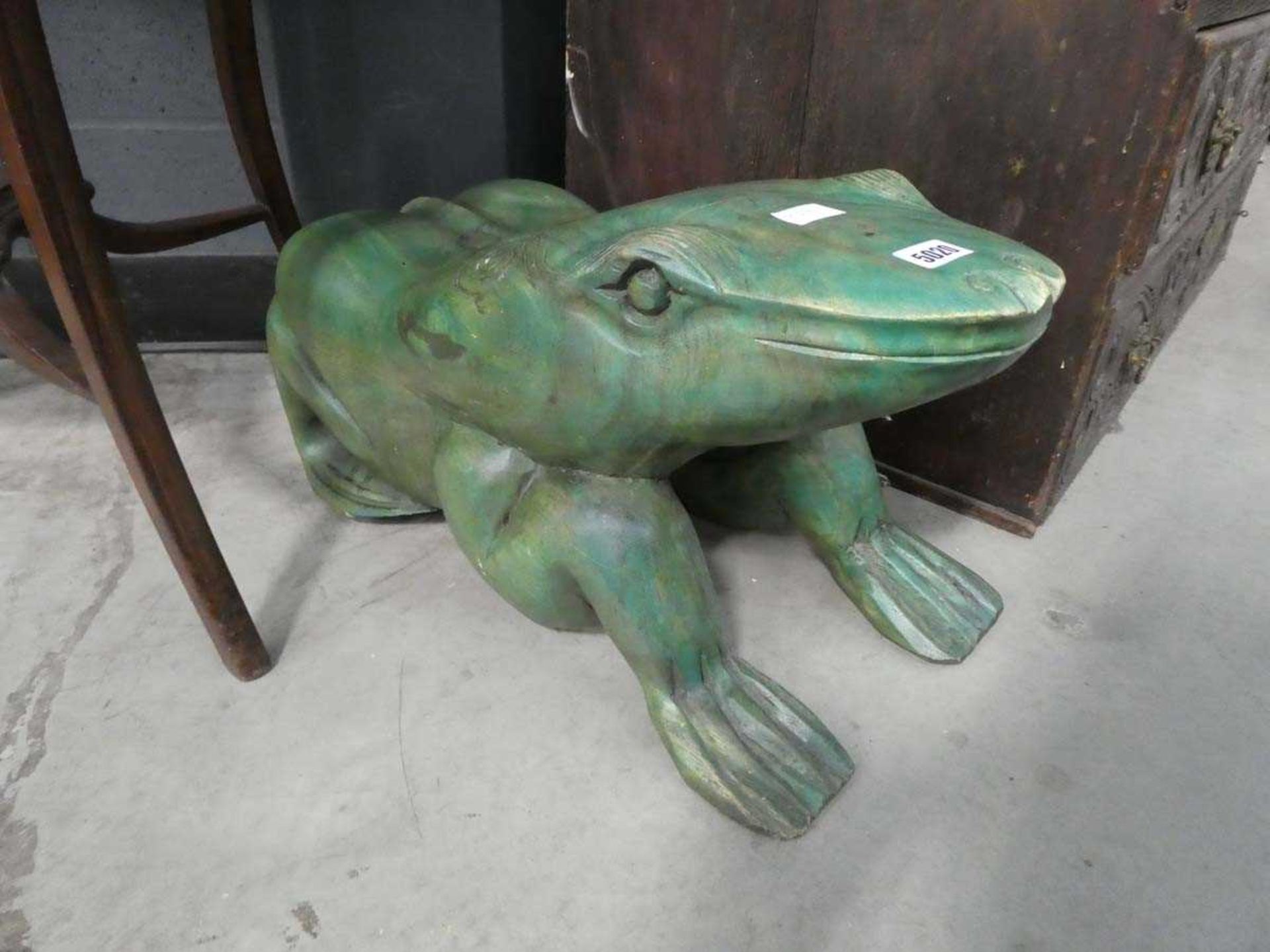 Green painted wooden frog