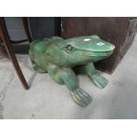 Green painted wooden frog