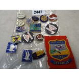 A group of Butlins, Fiat 850, Cleveland Discol and other badges together with a 1946 Butlins