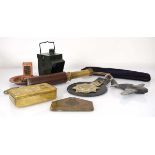 A group of military collectables including a signal lantern, a Grenadier Guards brass plate, a