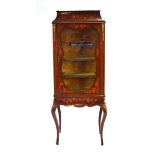 An early 20th century mahogany and marquetry display cabinet, the galleried surface over a single