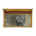 A 19th century giltwood and plaster landscape overmantle mirror with a plain frieze, 70 x 114 cm