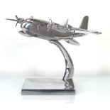 A chromed desk piece modelled as a Sunderland flying boat, h. 28 cm