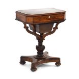 A William IV rosewood sewing table, the canted and bevelled surface lifting to reveal nine