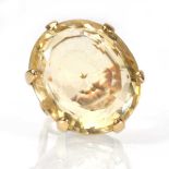 A 9ct yellow gold dress ring set oval citrine,ring size L 1/2,10.8 gms