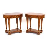 A pair of reproduction Italian side tables with oval crossbanded surfaces, single frieze drawers and