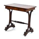 A mid-19th century rosewood side table with a single frieze drawer, scrolled supports and castors,