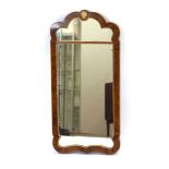 A Georgian style walnut and gilt highlighted two-section wall mirror, 65 x 31 cm