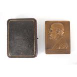 A cased bronze plaque commemorating the architect Richard Phene Spiers,