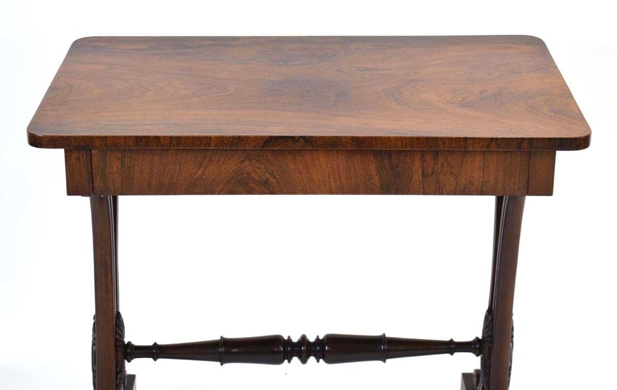 A mid-19th century rosewood side table with a single frieze drawer, scrolled supports and castors, - Image 3 of 4