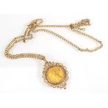 A yellow metal curblink necklace suspending a Victorian sovereign dated 1879 in a loose 9ct mount,