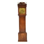 John Paxton of Saint Neots, an 18th century 'cottage' longcase clock with a brass face and oak