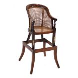A Regency mahogany and bergere childs highchair on stand, lacking slats and pole*Ex-collection of
