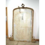 For Restoration: a 19th century giltwood overmantel mirror of large proportions surmounted by