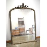 For Restoration, a Victorian giltwood overmantel mirror of large proportions surmounted by an