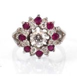 A 14ct white gold prunt ring set four tiers of diamonds and rubies, central stone approx 0.25