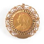 A 9ct yellow gold pendant/brooch set Victorian half sovereign dated 1894 in a loose mount, 7.2 gms