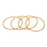 A set of four yellow metal bangles, internal d. approx. 6 cm, overall 38.4 gms (4) (af)Bangles