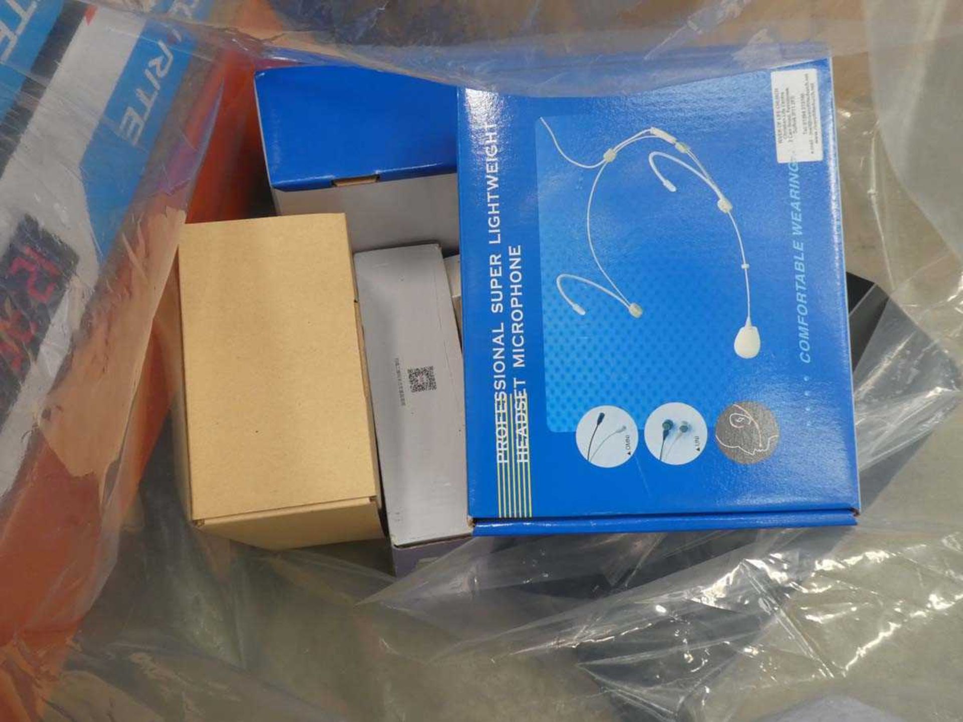 +VAT Bag containing wireless extender, headset, microphone, KVM switch, thermometer, etc.