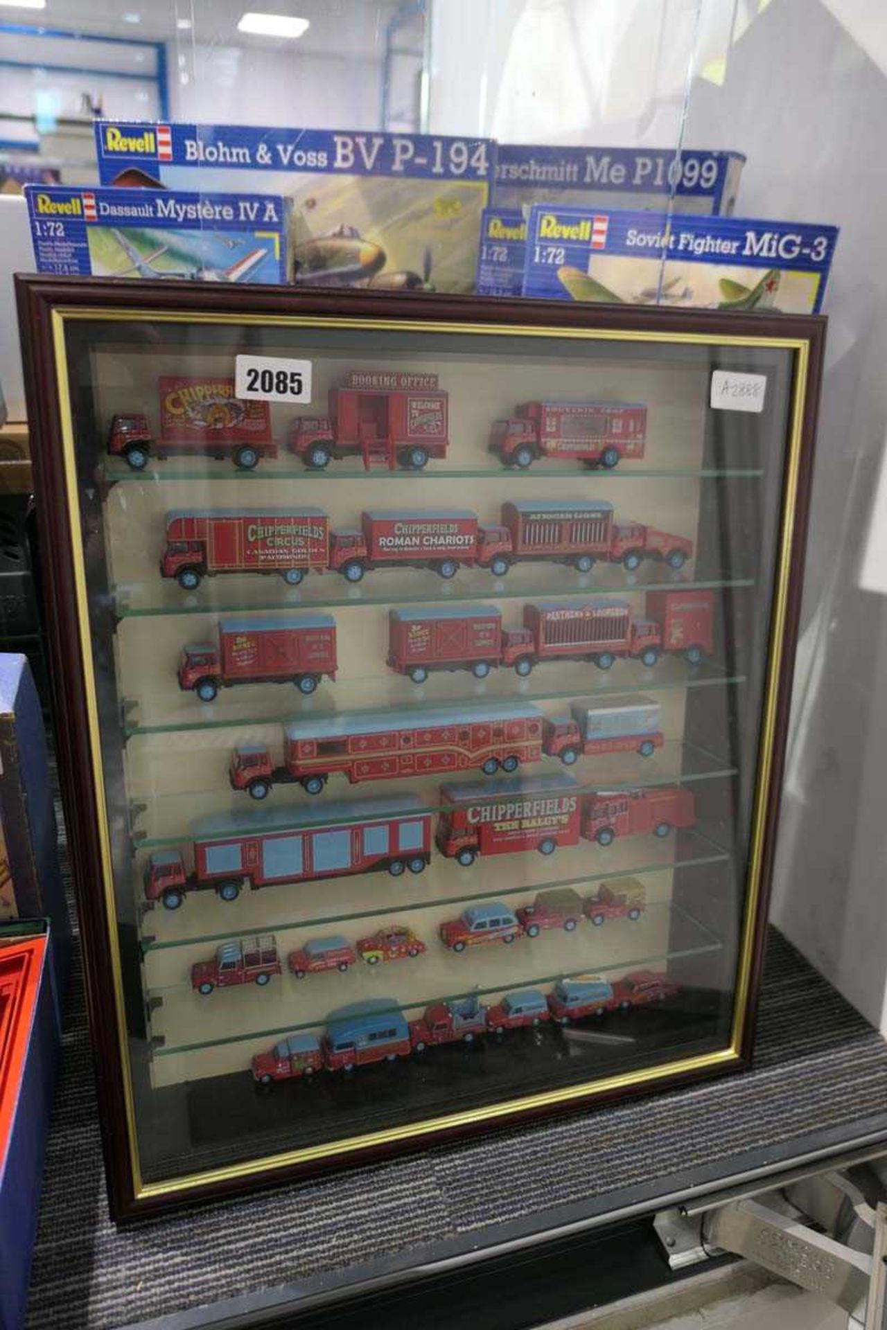 Framed and glazed set of collectable Chipperfield circus vehicles