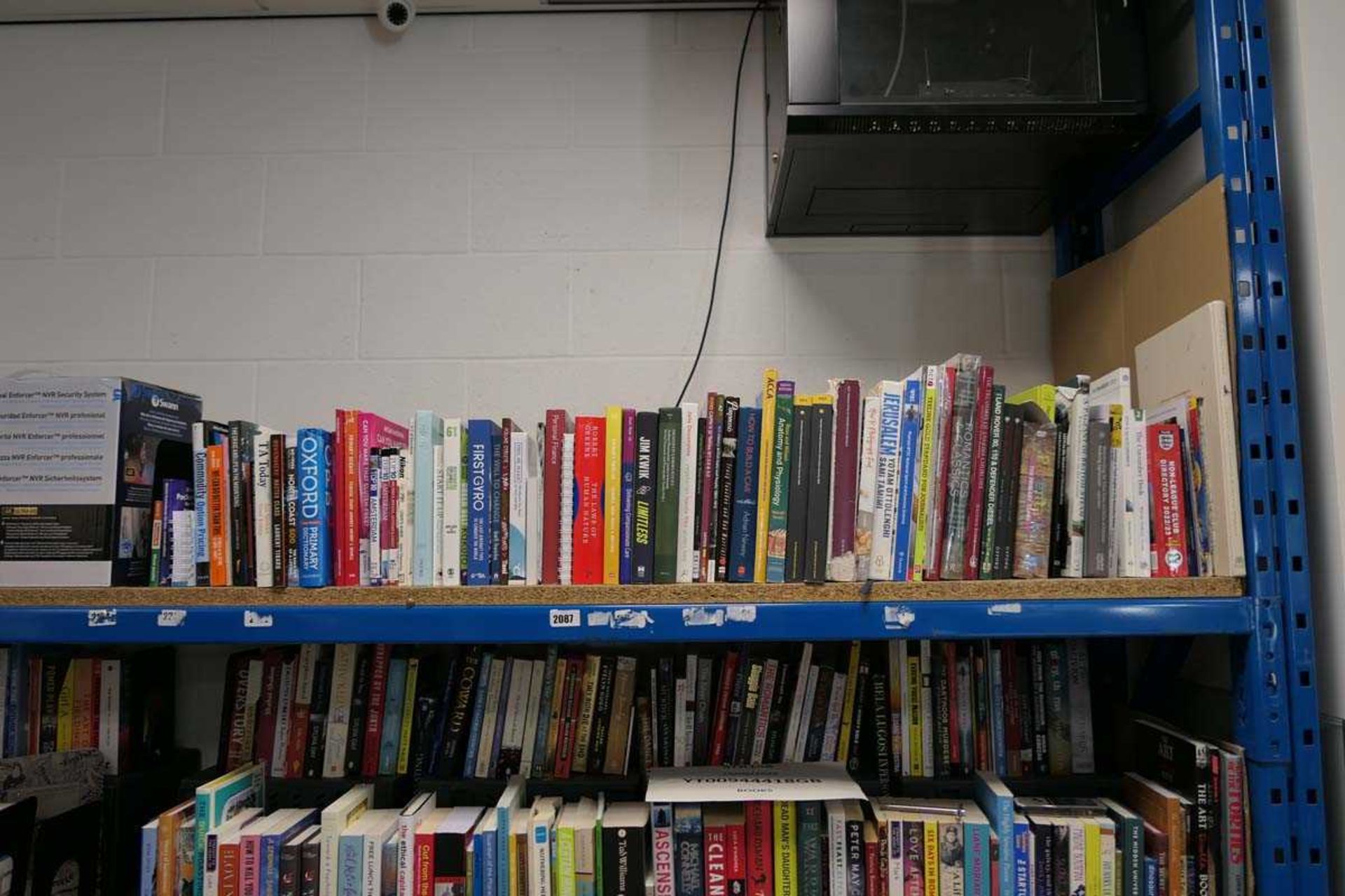 Selection of reference material books including various publishers: Pearson, Oxford, Harper Collins,