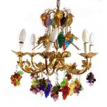 A gilt-metal six branch vine chandelier with Murano glass droplets modelled as bunches of grapesw.