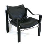 Maurice Burke for Arkana, a 1970's Safari chair with black slung seat, chromed rails and black