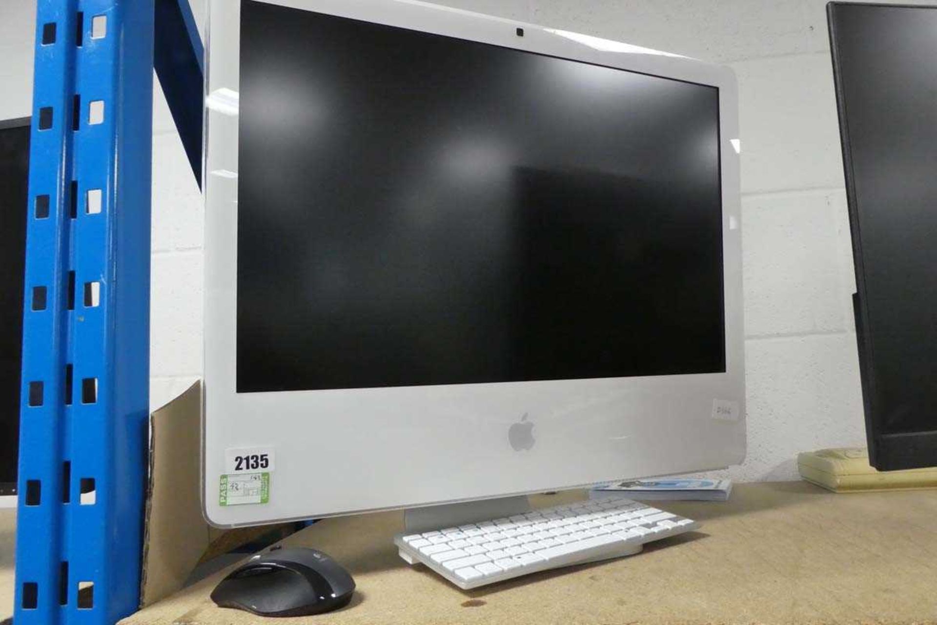 Apple iMac computer with replacement keyboard and mouse