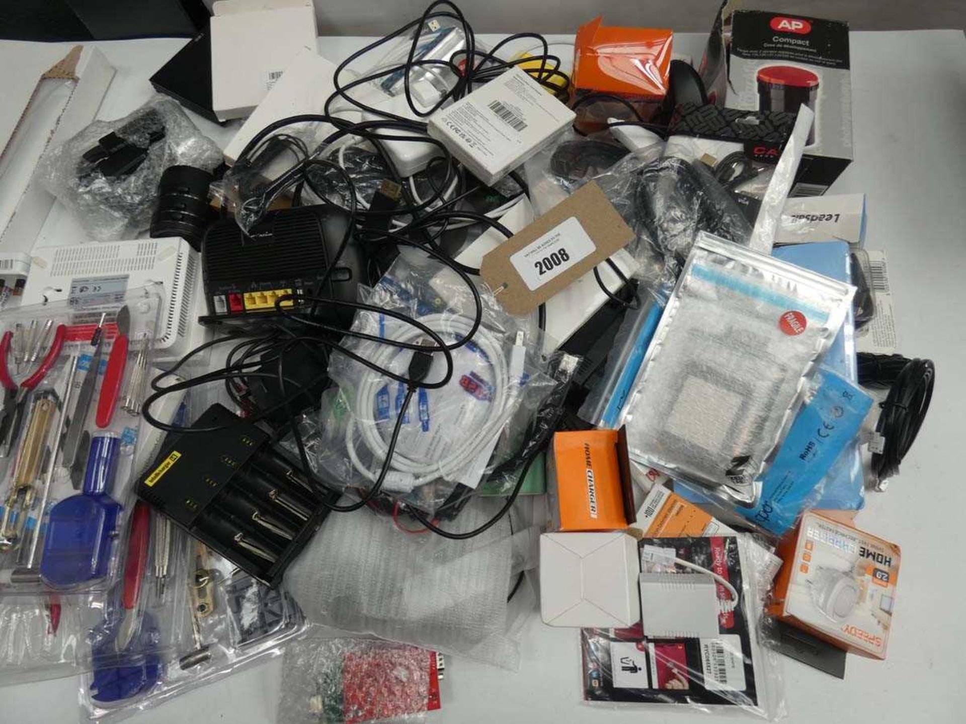 +VAT Bag containing cables, chargers, watch repair kits, adapters, plugs, etc