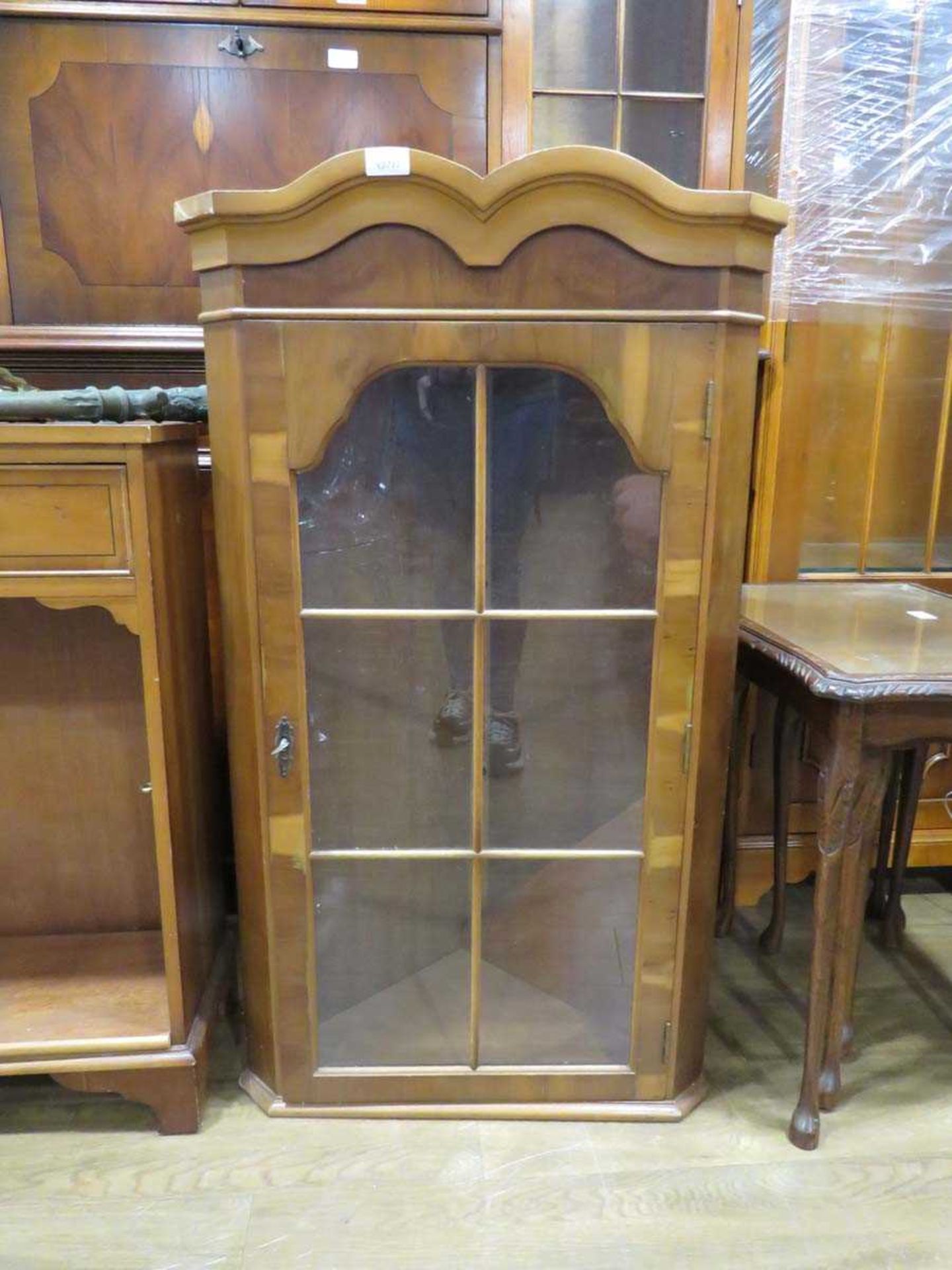 Two drawer open fronted bookcase and a hanging yew glazed display cabinet