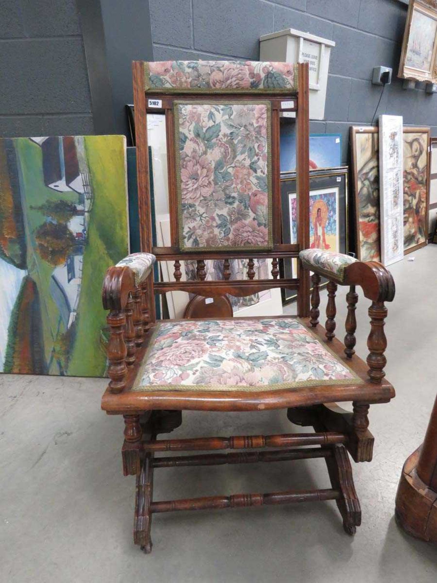 Floral upholstered rocking chair