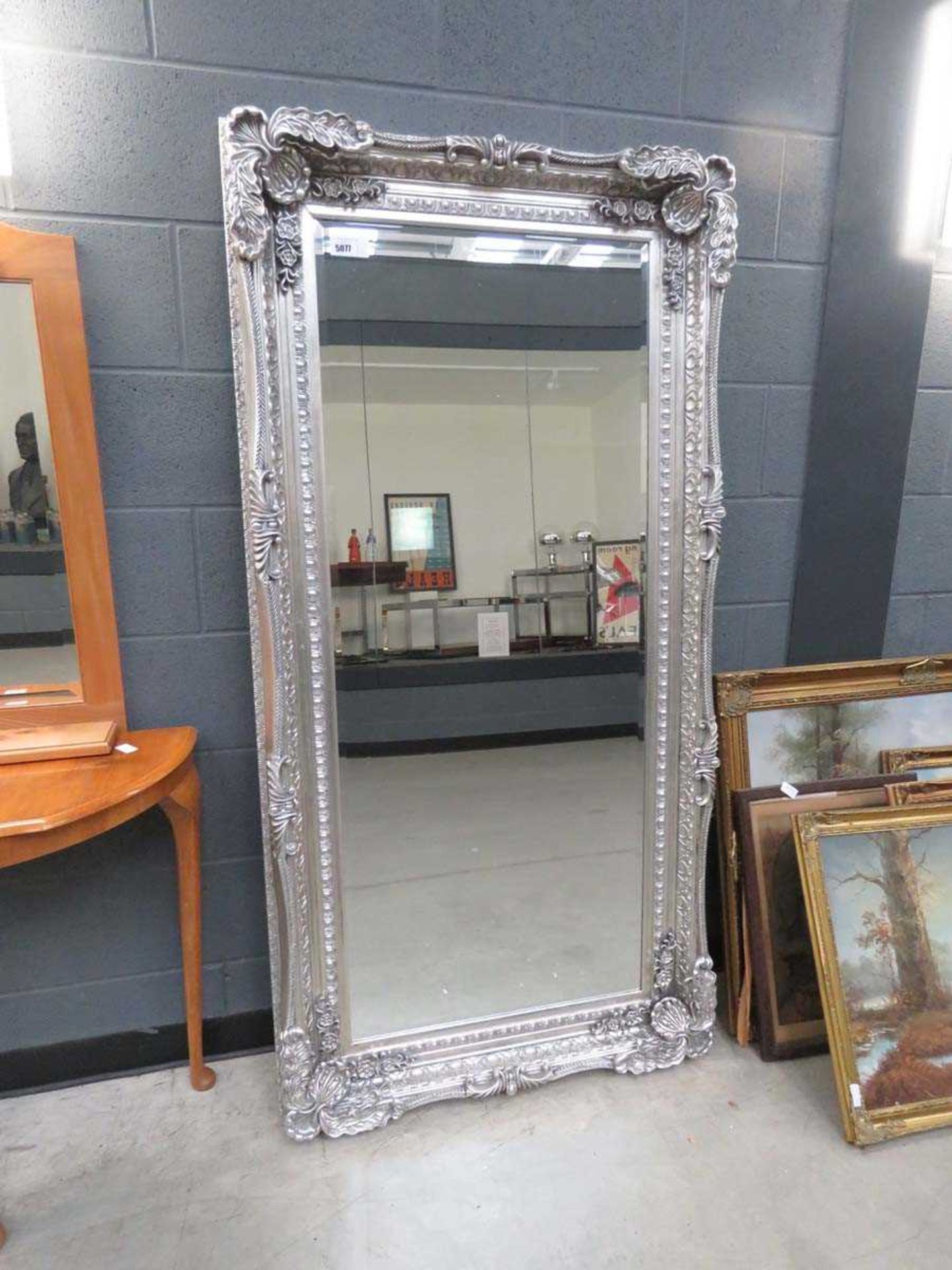 +VAT Large rectangular decorative gilt framed and bevelled mirror