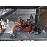 Cage containing military belts, gloves, regimental ties and figure of an infantry man