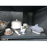 Cage containing blue and white terrine, cheese dish, egg cups and candleholders