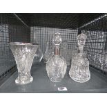 Cage containing quantity of decanters