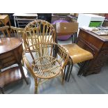 4 x stacking chairs plus a bent cane armchair