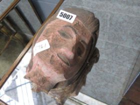 Carved wooden ladies head