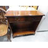 Reproduction mahogany open bookcase with two drawers over