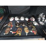Cage containing miniature Venetian masks