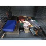 Cage containing an ornamental fan, boxed cutlery sets, paperweight, cufflinks and pens