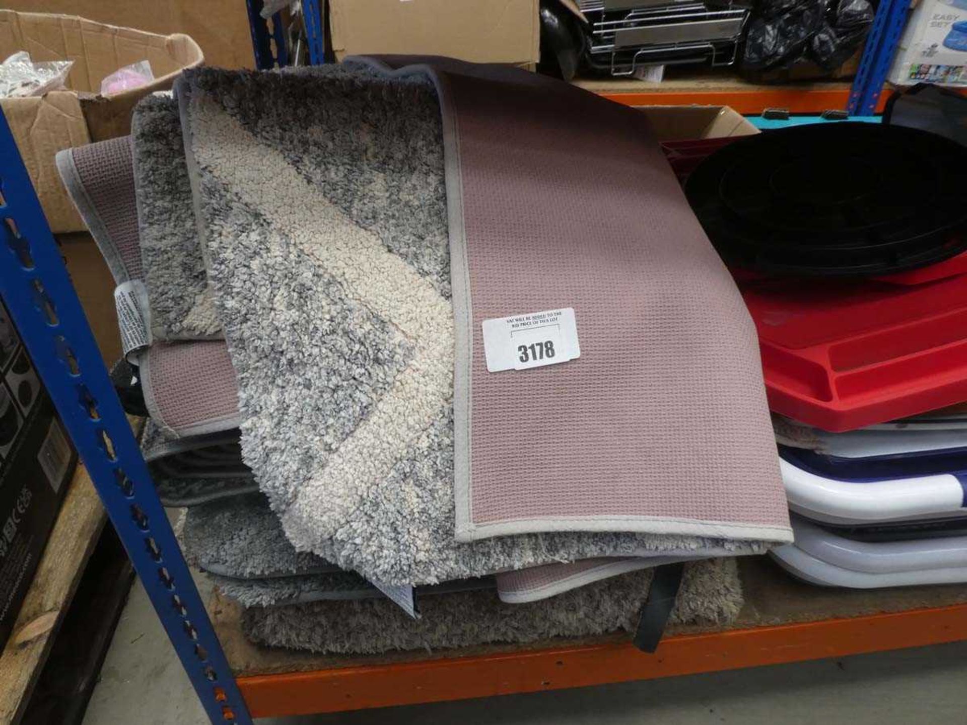 +VAT Stack of various bath rugs and mats