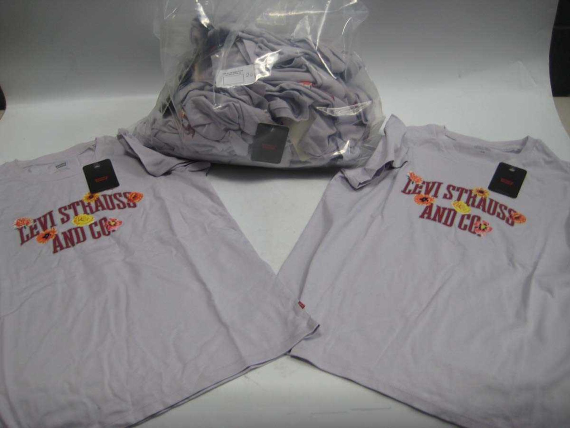 +VAT A bag containing 20x Ladies Levi T Shirts in various sizes