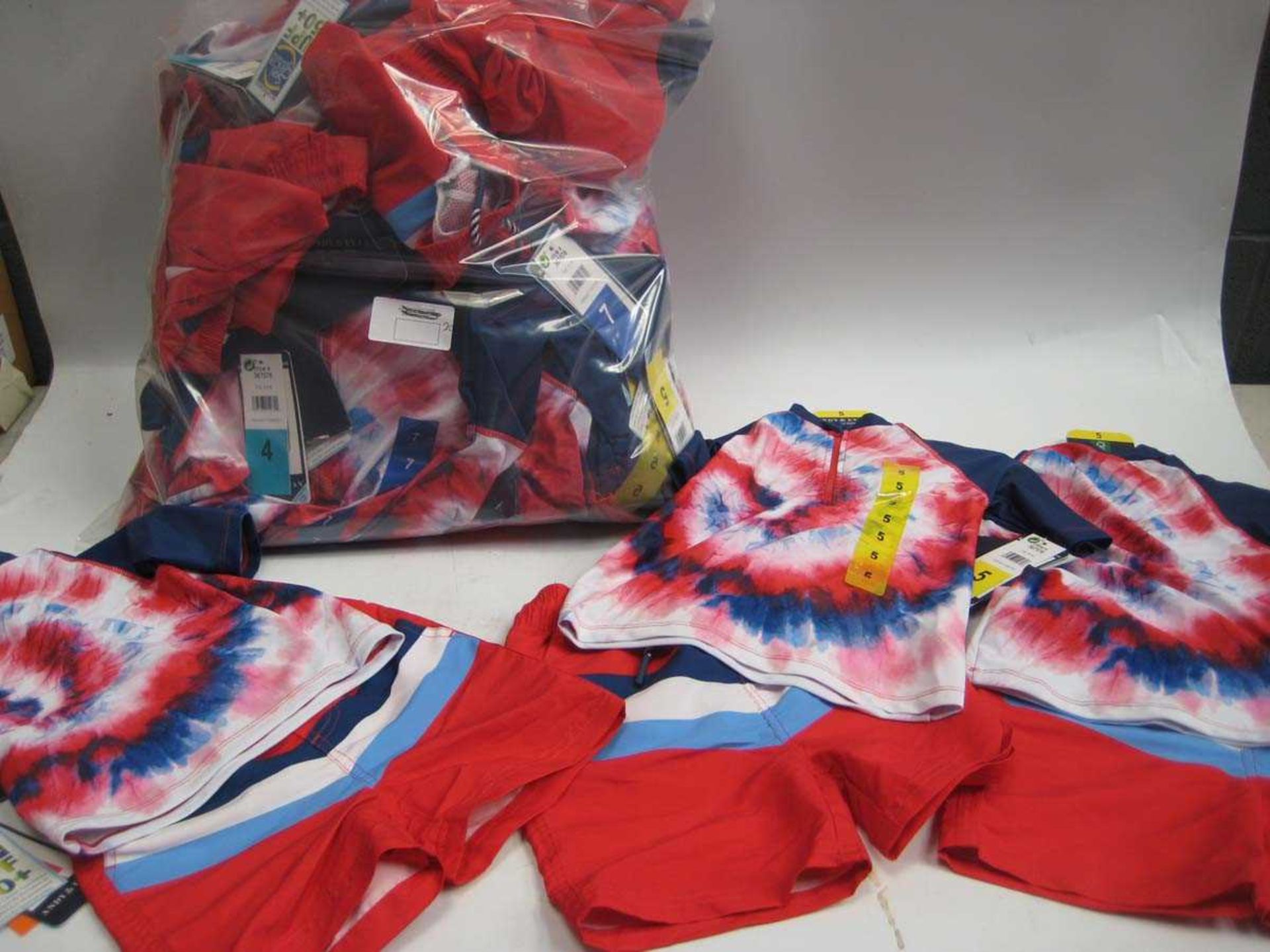 A bag containing 20x sets of Children's Swim Wear in various sizes.