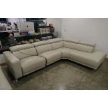 +VAT Beige leather upholstered corner sofa system with electric reclining
