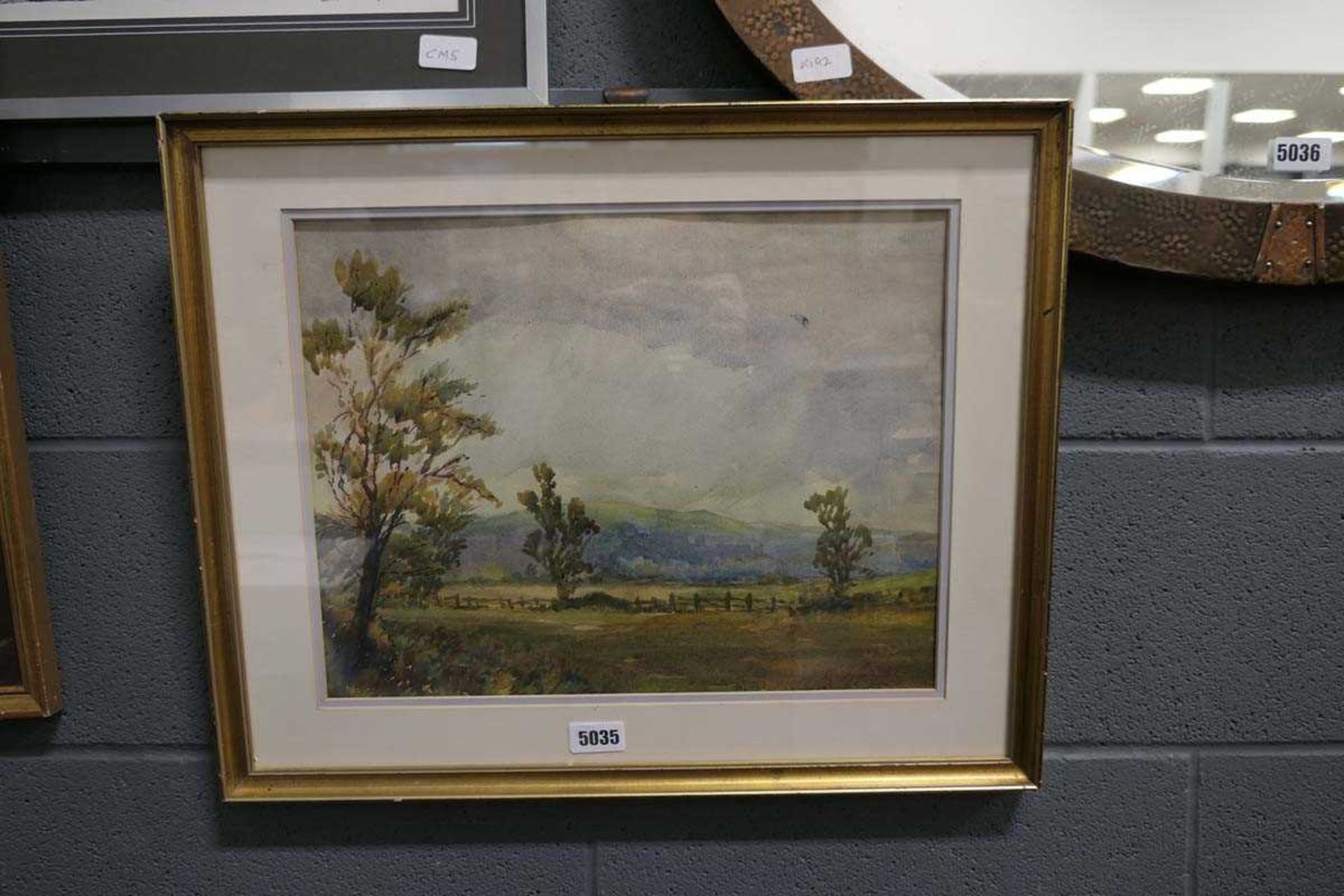 Gilt framed and glazed watercolour of a woodland scene